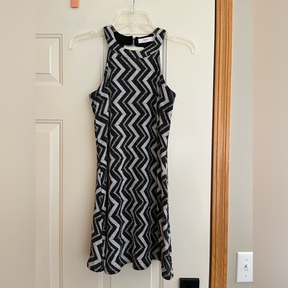 Candie’s black and silver sparkle chevron mod halter mini dress. Size XS